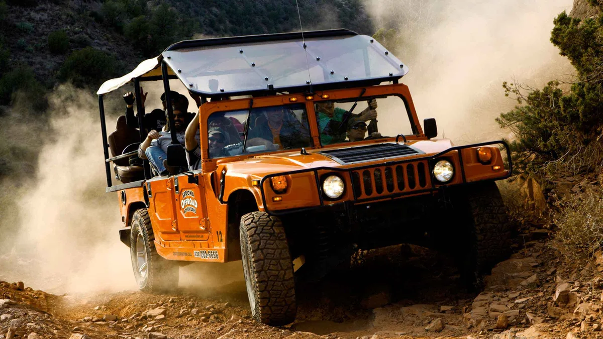 Forward-seating Hummer descending the Cliff Hanger Trail, Sedona