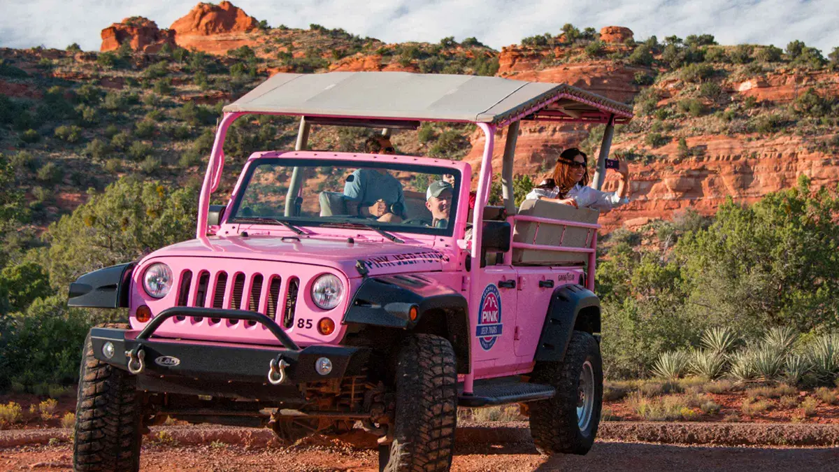 Jeep parked near a red rock vortex site on a Sedona jeep tour